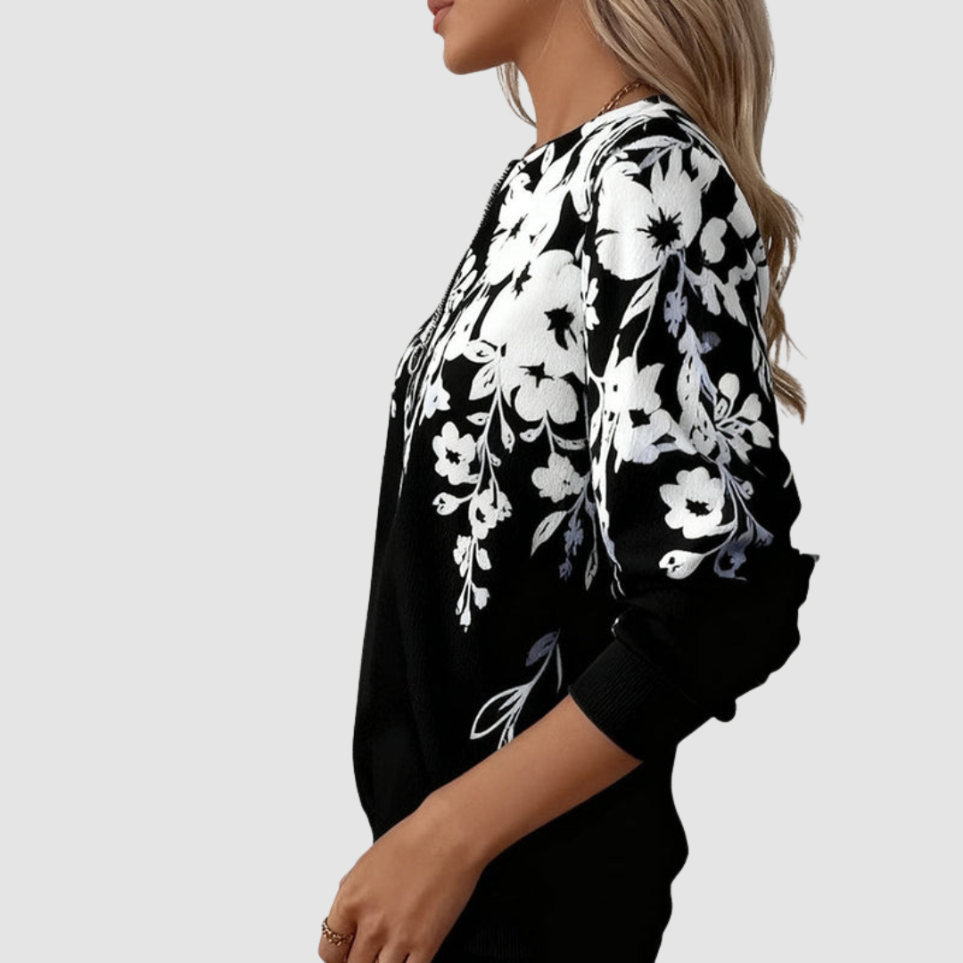Gunhild – Blommig tröja med halvlång dragkedja