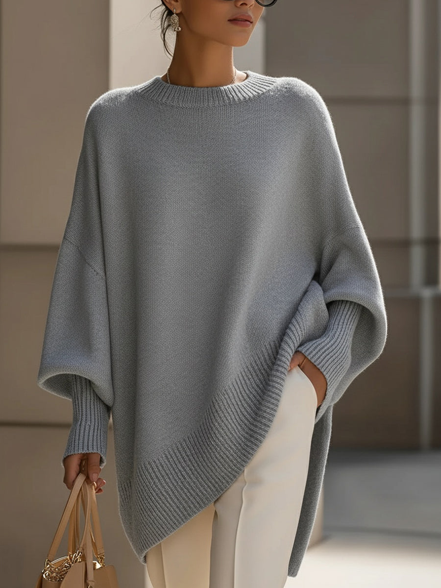 Laila – Oversize stickad tröja med asymmetrisk kant
