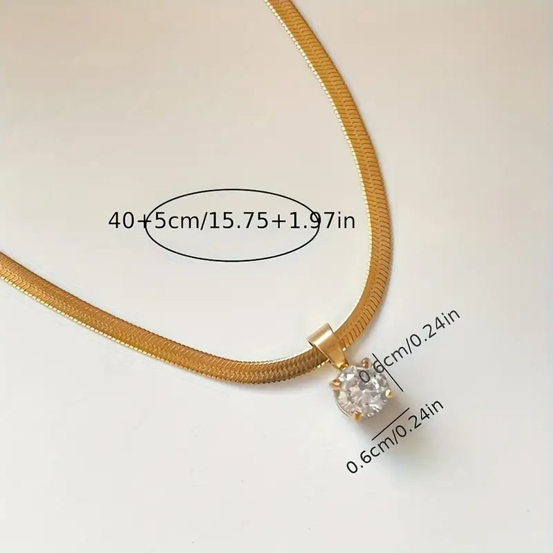 Berit – elegant guldhalsband med rinhalstenshänge