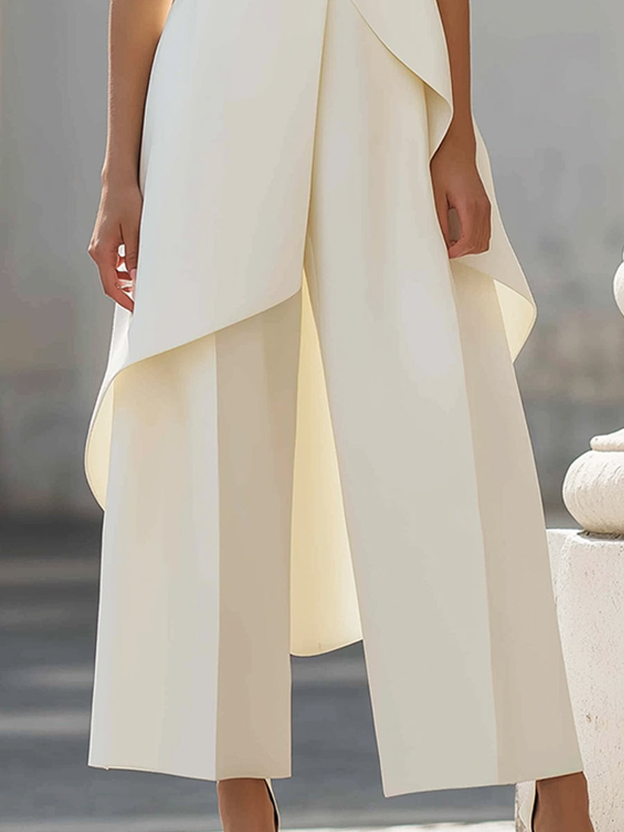 Alice – Elegant jumpsuit med asymmetrisk volang