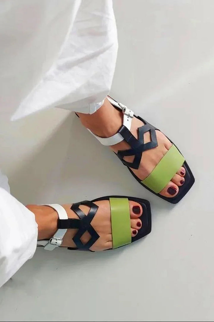 Irma – Platta sandaler med cut-out och spänne