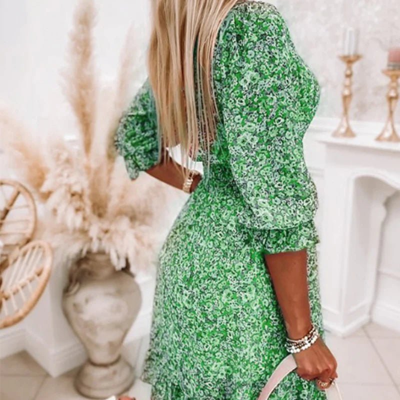 Ebba – Blommig miniklänning med volang