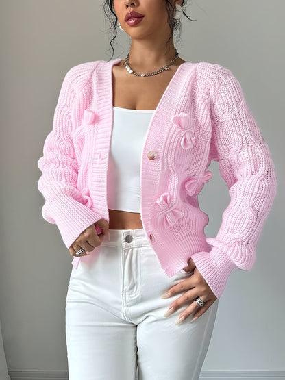 Lilly – Stickad kofta med rosettdetaljer