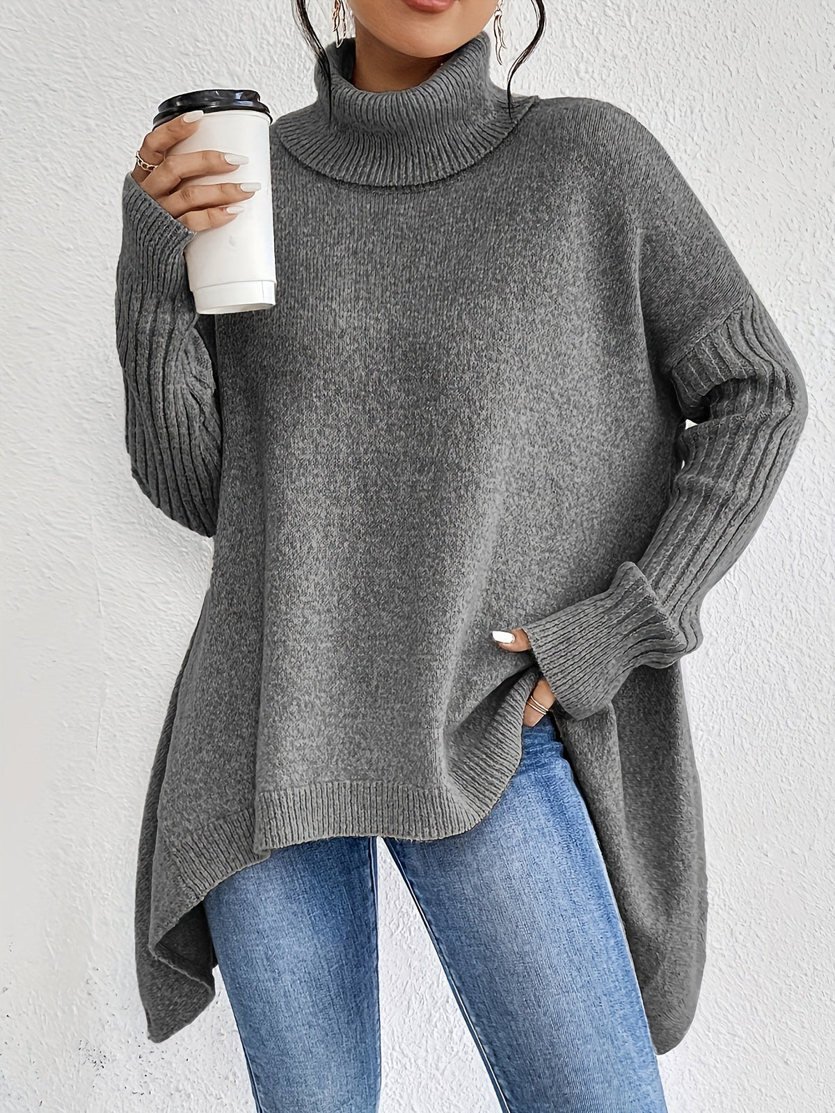 Elva – Oversized polotröja med asymmetrisk kant