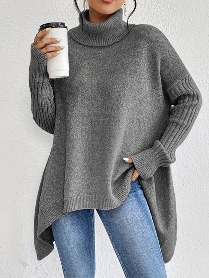 Elva – Oversized polotröja med asymmetrisk kant