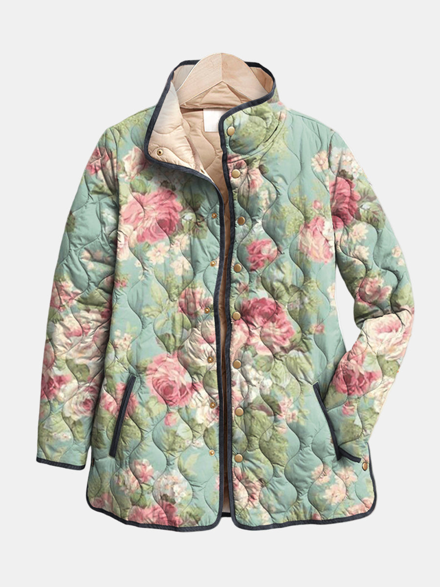 Judit – Quiltad jacka med retroblommigt mönster
