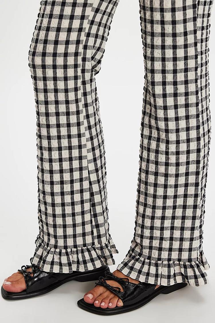 Marta – Platta sandaler med rosettdetalj