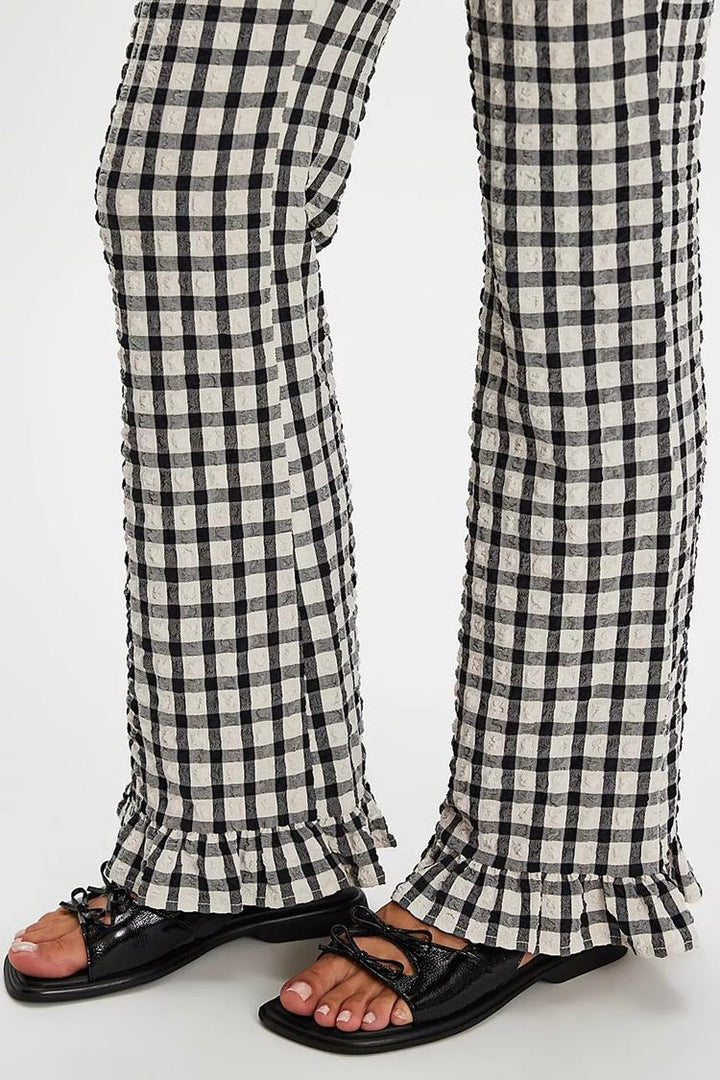 Marta – Platta sandaler med rosettdetalj