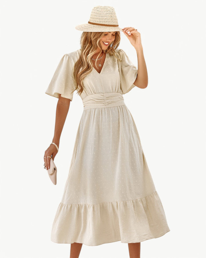 Ulla – Elegant flödande sommarklänning med v-ringning
