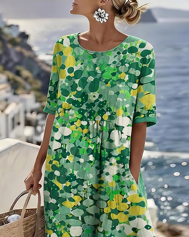 Sheena – Lös midiklänning med blommönster
