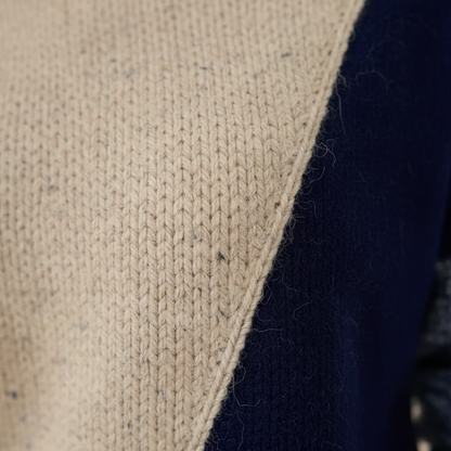Helga – Stickad polotröja med colour block-mönster
