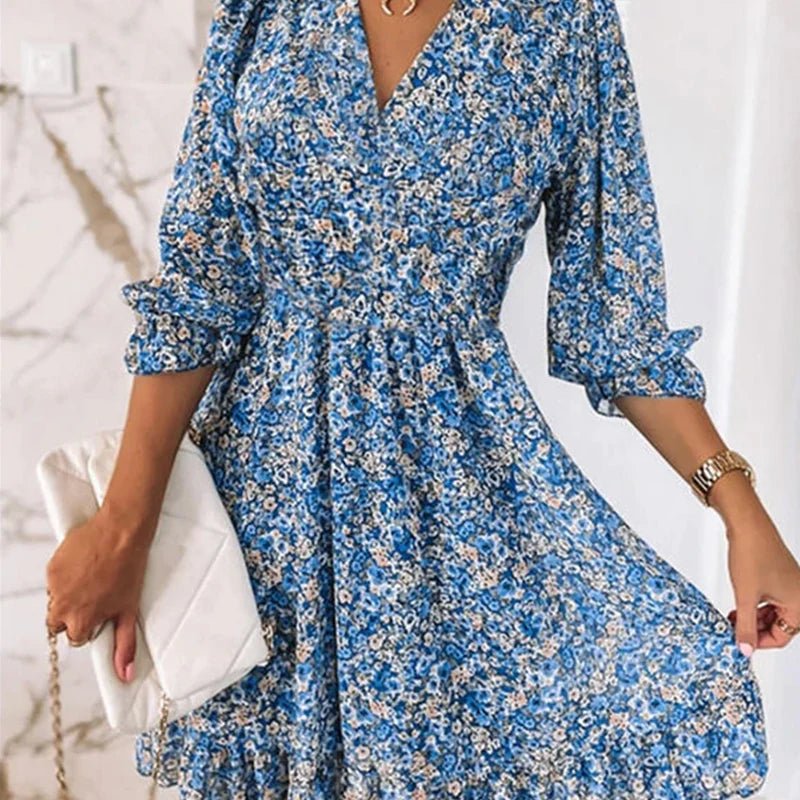 Emelie – Midi-klänning med v-ringning och blommönster
