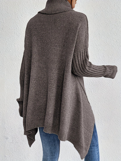 Elva – Oversized polotröja med asymmetrisk kant