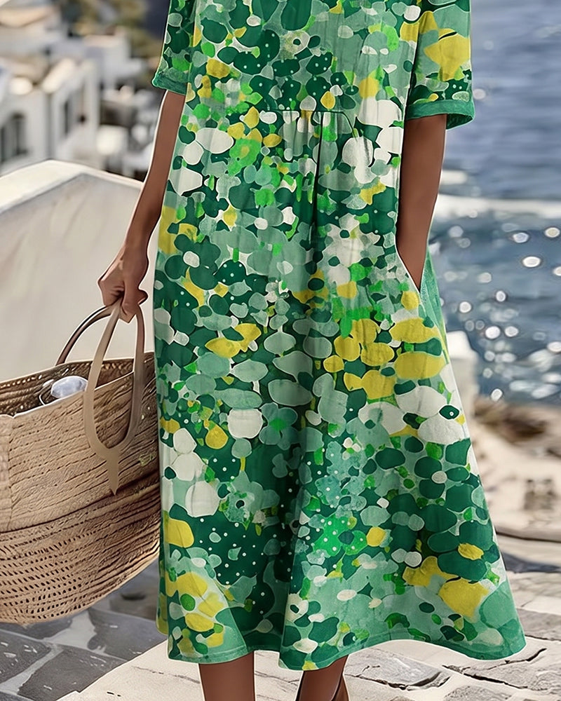 Sheena – Lös midiklänning med blommönster