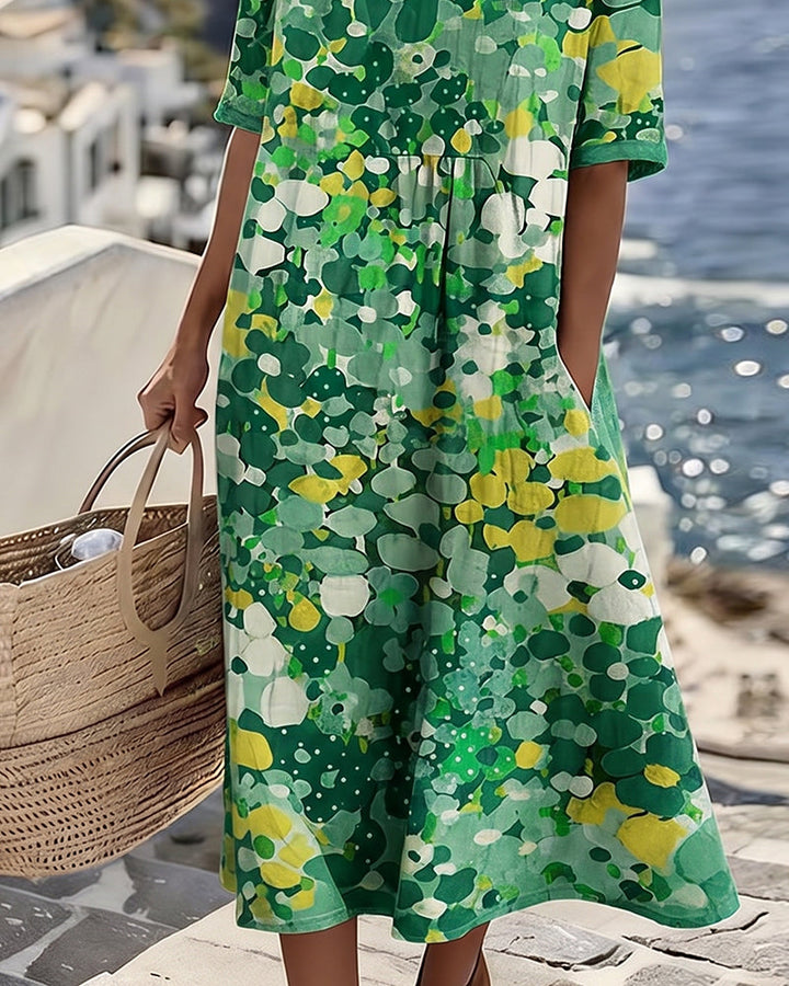 Sheena – Lös midiklänning med blommönster