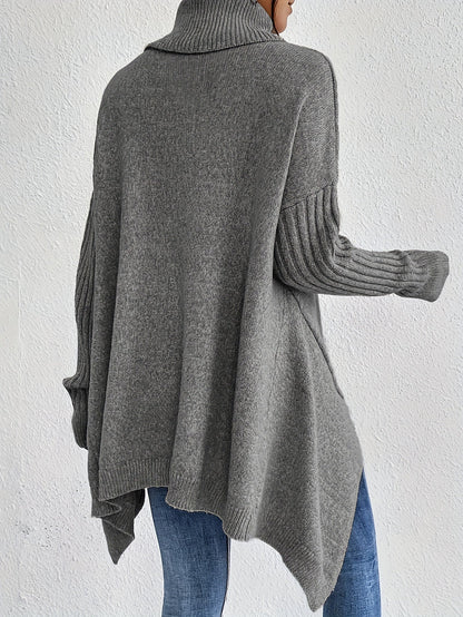 Elva – Oversized polotröja med asymmetrisk kant