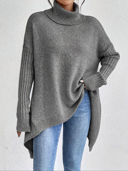 Elva – Oversized polotröja med asymmetrisk kant