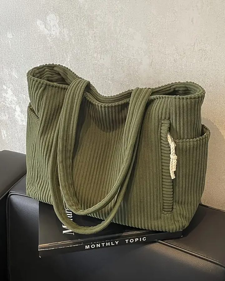 Edit – Ribbad toteväska med snodddetalj