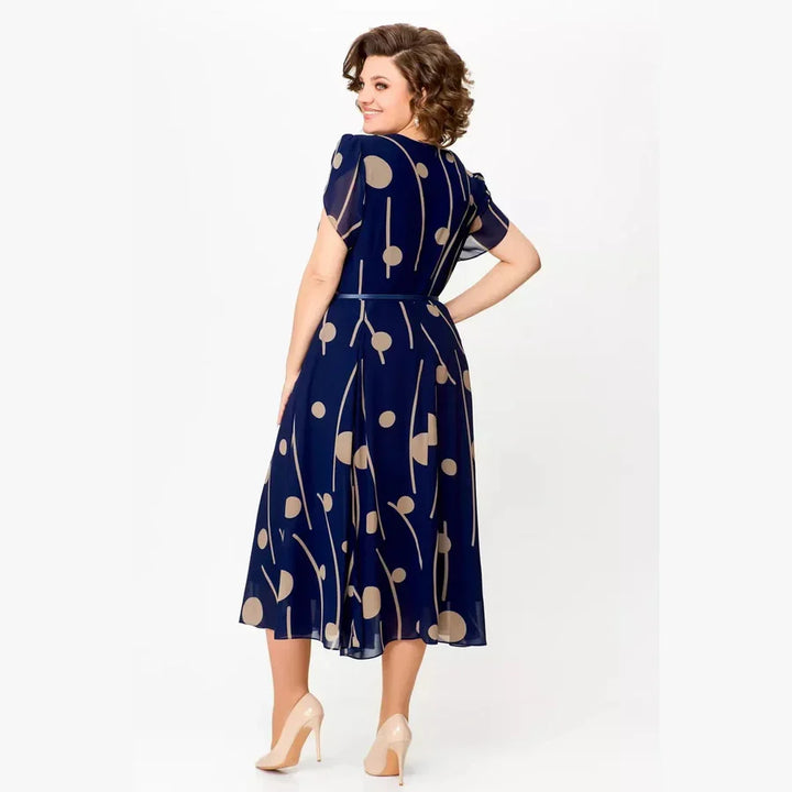 Tove – Mönstrad midiklänning i chiffon