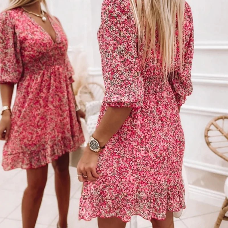 Emelie – Midi-klänning med v-ringning och blommönster