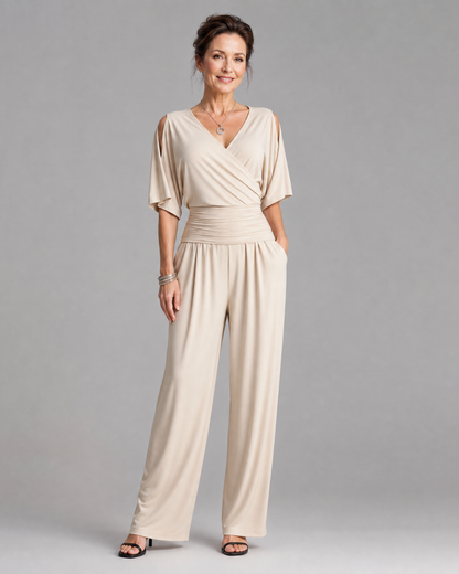 Tilda – Avslappnad overall med cold shoulder och omlottmidja