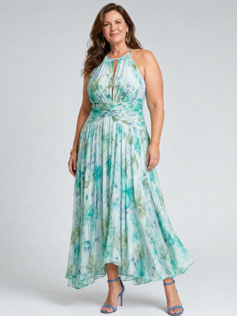 Petra – Plisserad halter midi-klänning med mjukt blommönster