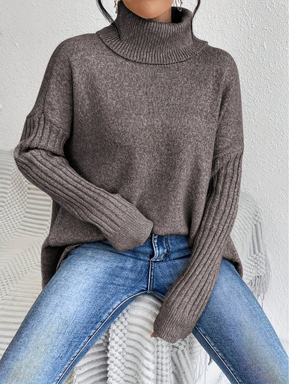 Elva – Oversized polotröja med asymmetrisk kant