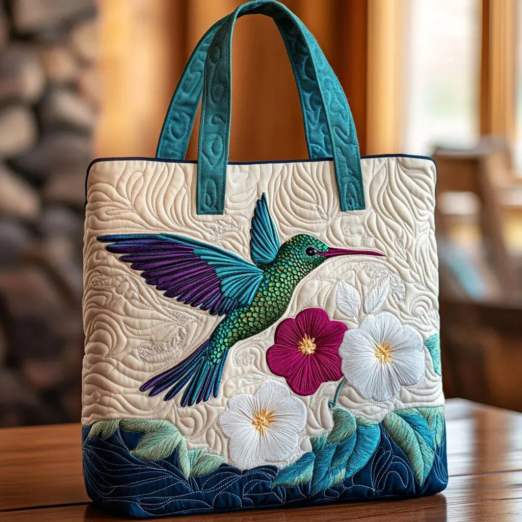 Vivi – Vadderad tote med kolibri och blommor
