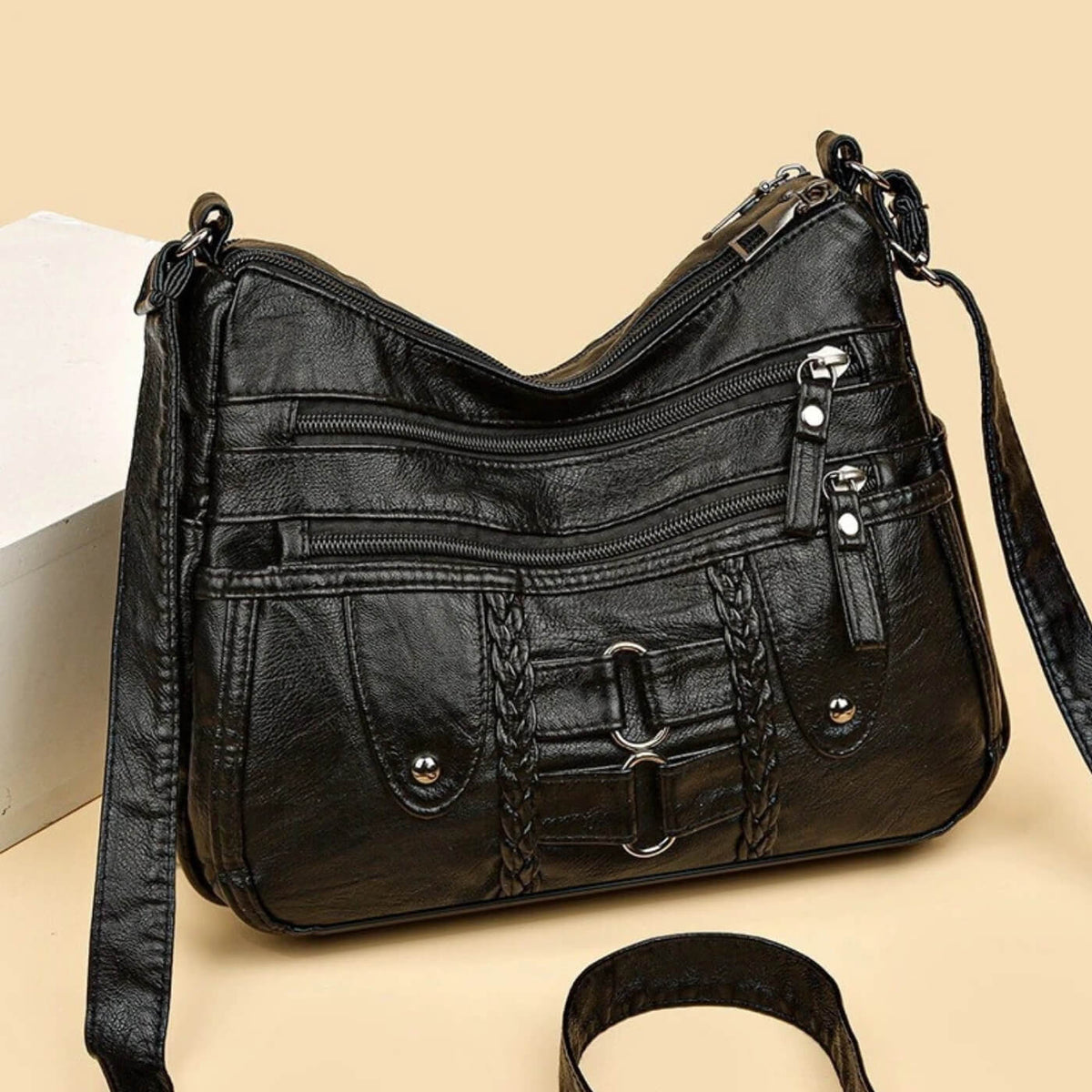 Agneta – Crossbodyväska med flätade detaljer