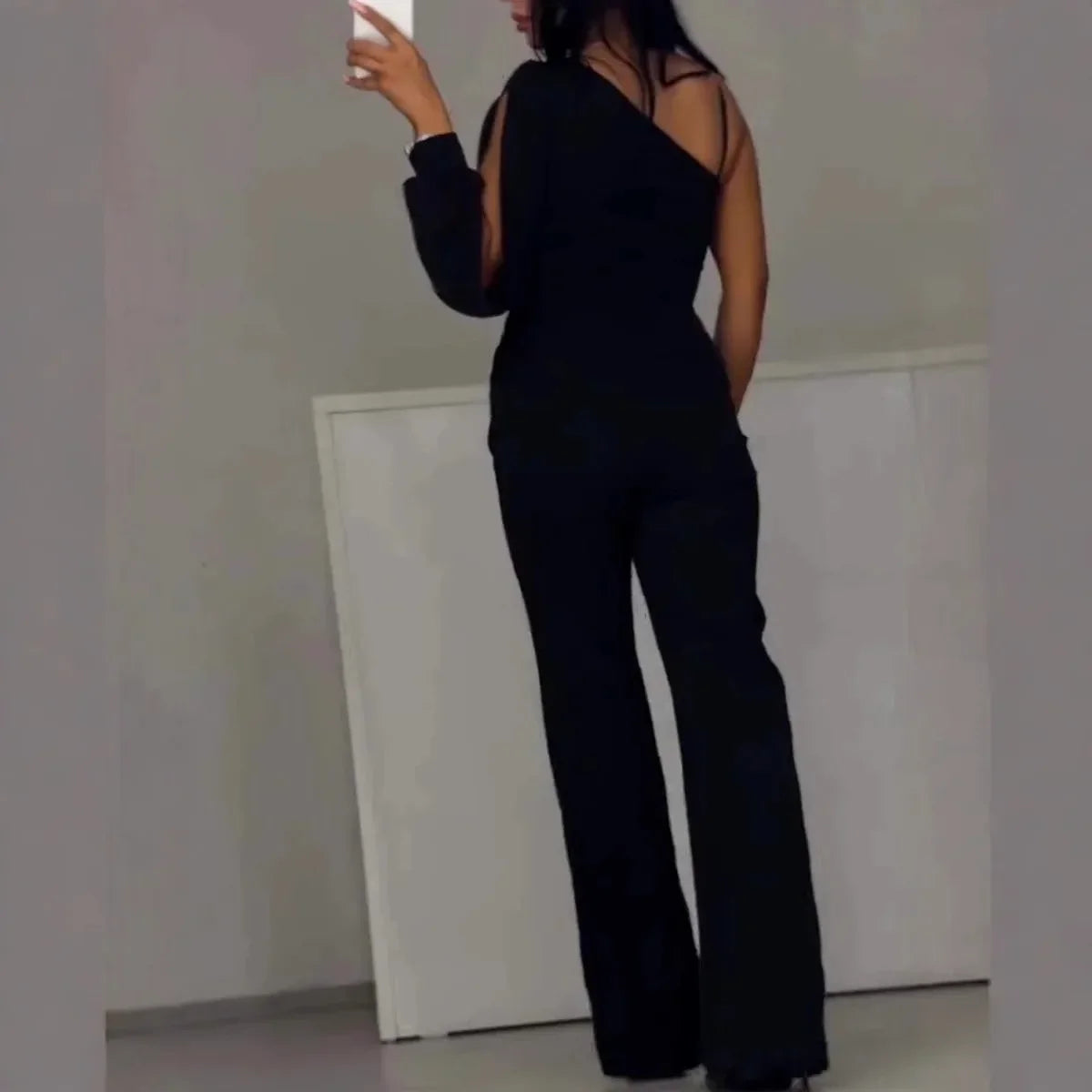 Martina – Elegant jumpsuit med meshdetalj