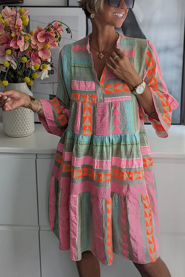 Birgitta – Elegant klänning med utsvängda ärmar