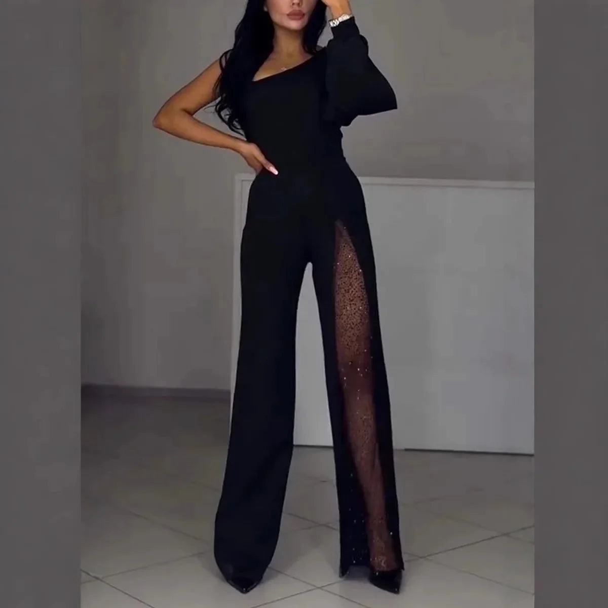Martina – Elegant jumpsuit med meshdetalj