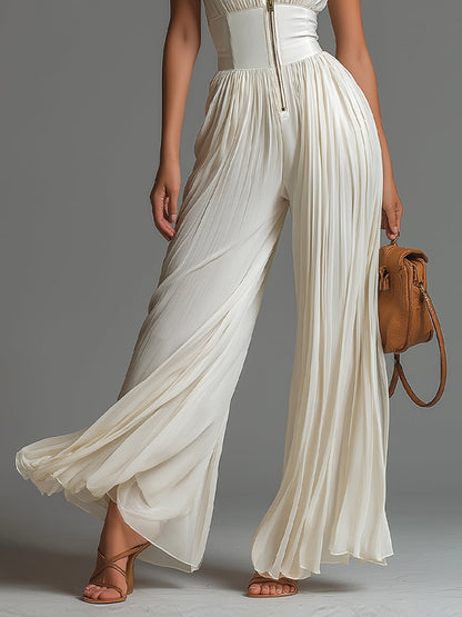 Bodil – Plisserad jumpsuit med vid benvidd