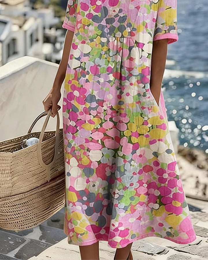 Sheena – Lös midiklänning med blommönster