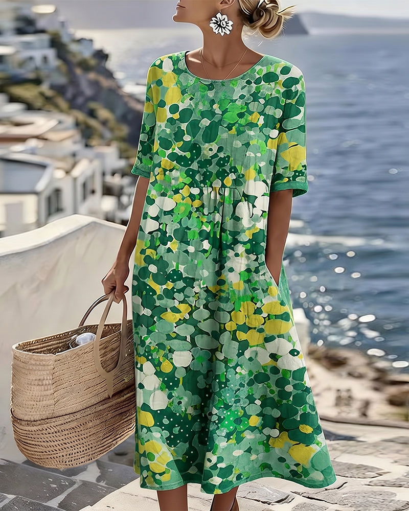 Sheena – Lös midiklänning med blommönster