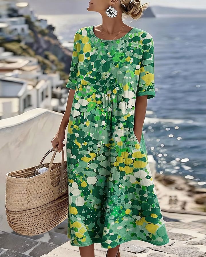 Sheena – Lös midiklänning med blommönster