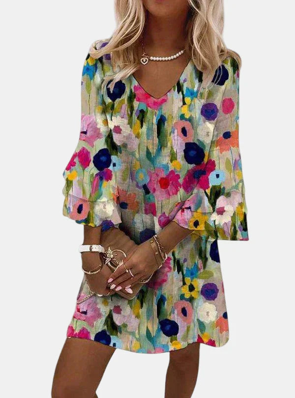 Camilla – Elegant blommig miniklänning