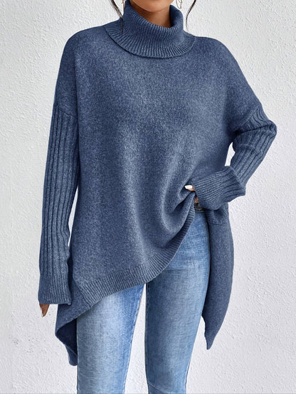 Elva – Oversized polotröja med asymmetrisk kant
