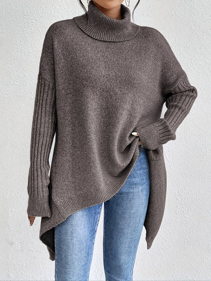 Elva – Oversized polotröja med asymmetrisk kant
