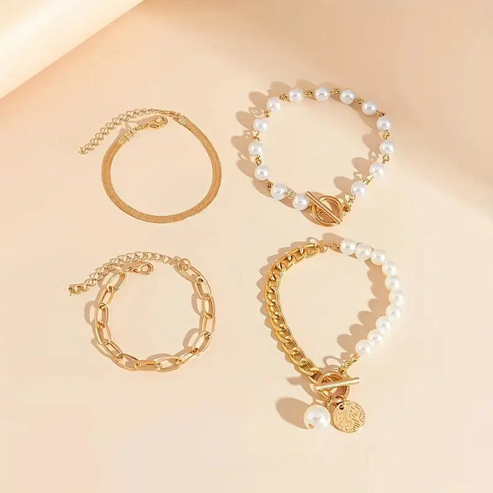 Vendela – Elegant 4-delat guldarmbandset med orm, pärlor och länkar