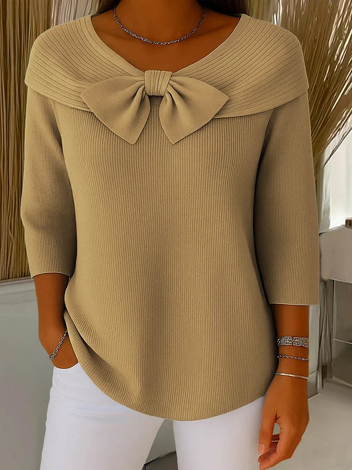 Olivia – Ribbstickad tröja med rosettdetalj