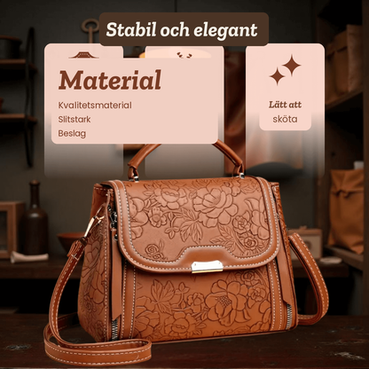 Majken – Handväska med präglat blommönster – handgjord av Astrid Göteborg