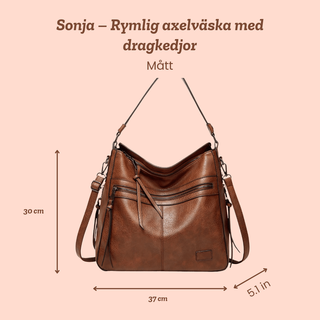 Sonja – Rymlig axelväska med dragkedjor – handgjord av Astrid Göteborg