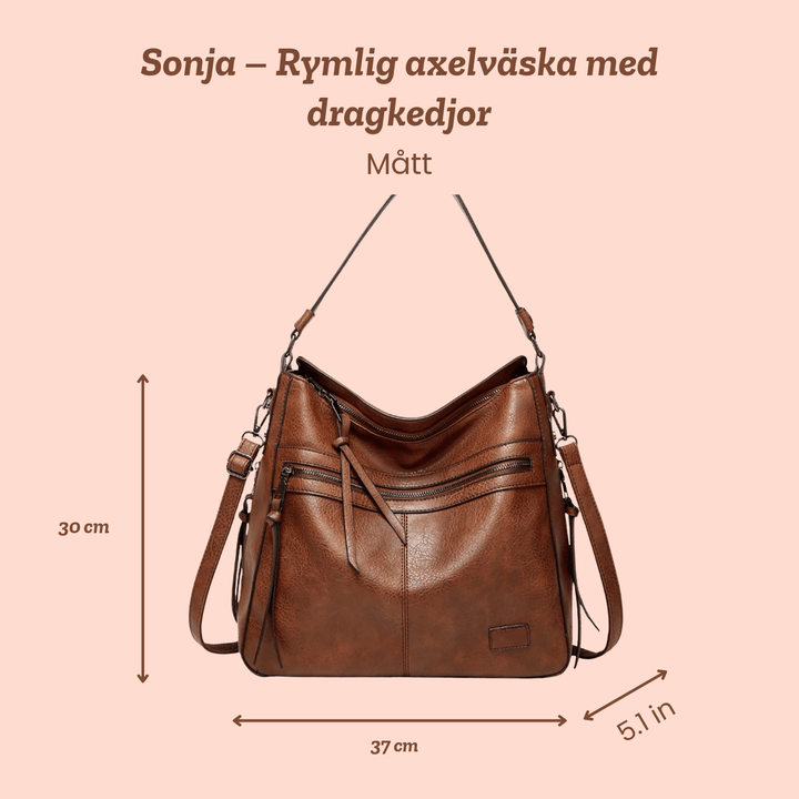 Sonja – Rymlig axelväska med dragkedjor – handgjord av Astrid Göteborg