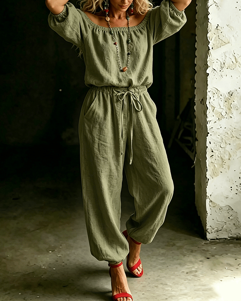 Vivi – Axelbandslös jumpsuit med puffärm