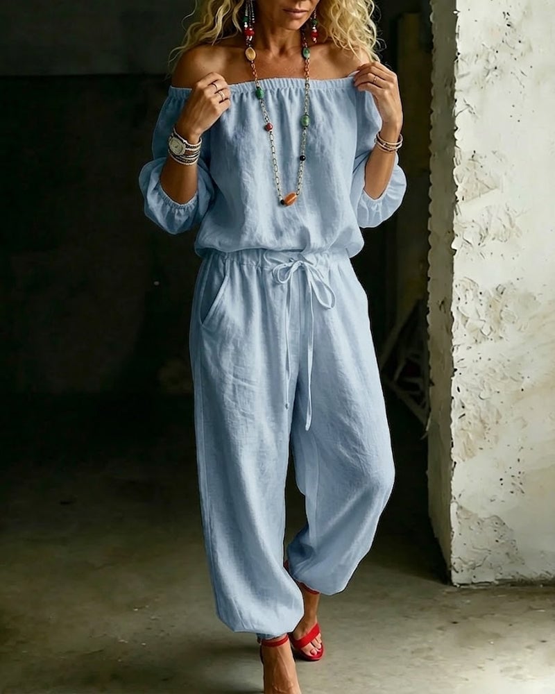 Vivi – Axelbandslös jumpsuit med puffärm