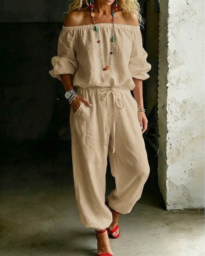 Vivi – Axelbandslös jumpsuit med puffärm