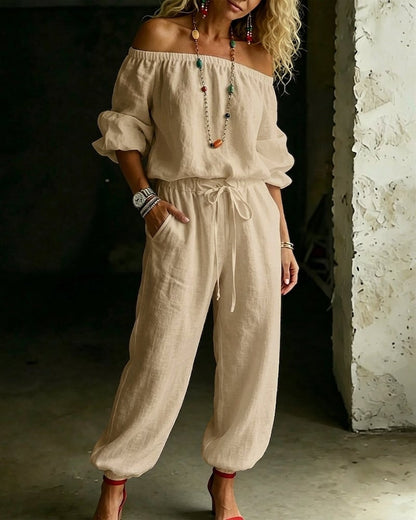 Vivi – Axelbandslös jumpsuit med puffärm