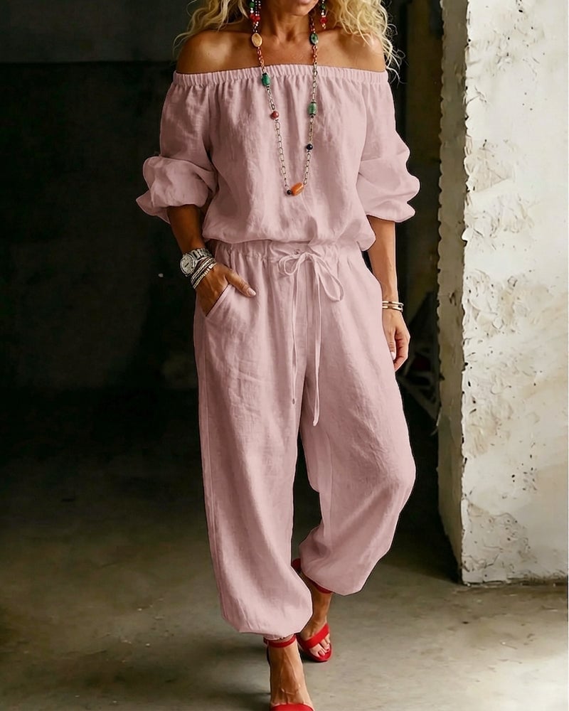 Vivi – Axelbandslös jumpsuit med puffärm