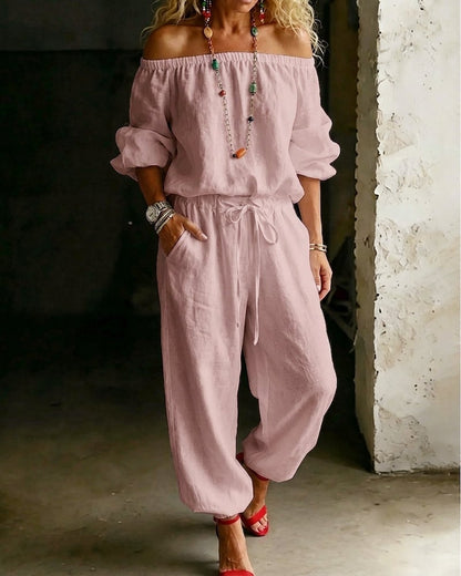 Vivi – Axelbandslös jumpsuit med puffärm